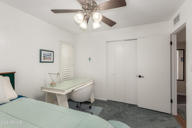 2843 E Captain Dreyfus Ave, Phoenix, AZ 85032 - carpeted bedroom with a closet and ceiling fan