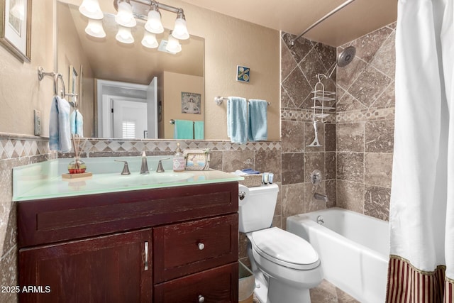 2843 E Captain Dreyfus Ave, Phoenix, AZ 85032 - bathroom with tile walls, shower / tub combo, vanity, and wainscoting