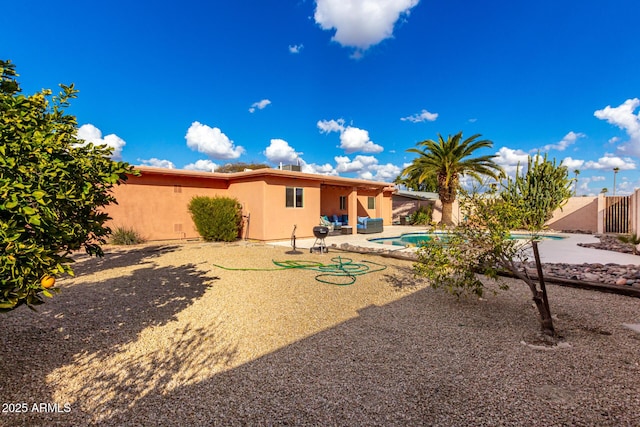 2843 E Captain Dreyfus Ave, Phoenix, AZ 85032 - rear view of house with a patio and stucco siding