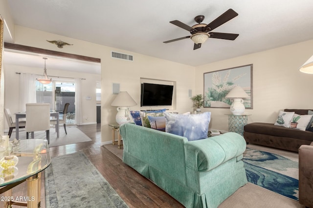 2843 E Captain Dreyfus Ave, Phoenix, AZ 85032 - living area with ceiling fan and wood finished floors