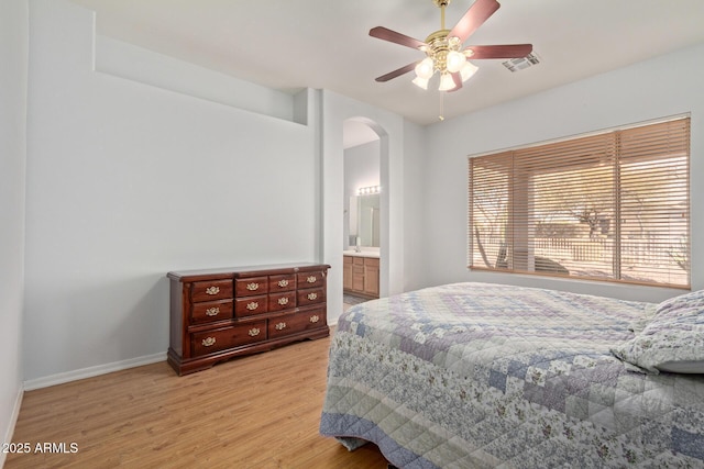 bedroom with light wood-type flooring and ceiling fan