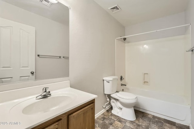 full bath featuring toilet, shower / washtub combination, vanity, and visible vents