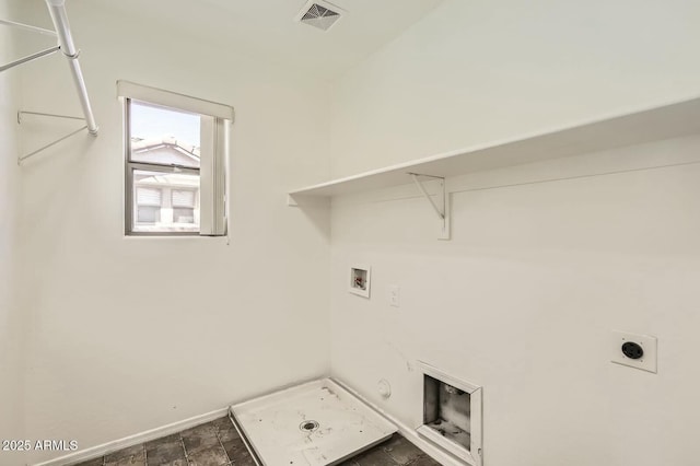 clothes washing area featuring laundry area, visible vents, gas dryer hookup, hookup for a washing machine, and electric dryer hookup