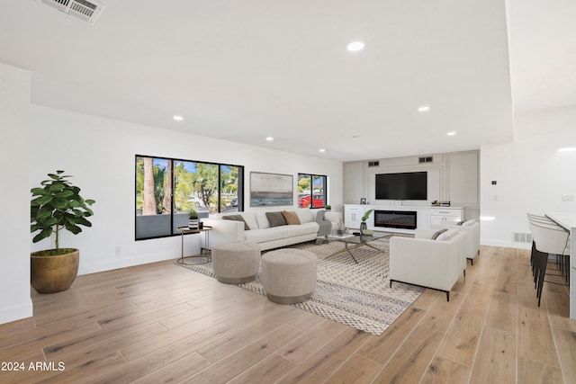 living room featuring light wood-type flooring