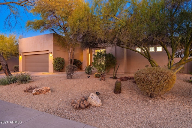 adobe home with a garage