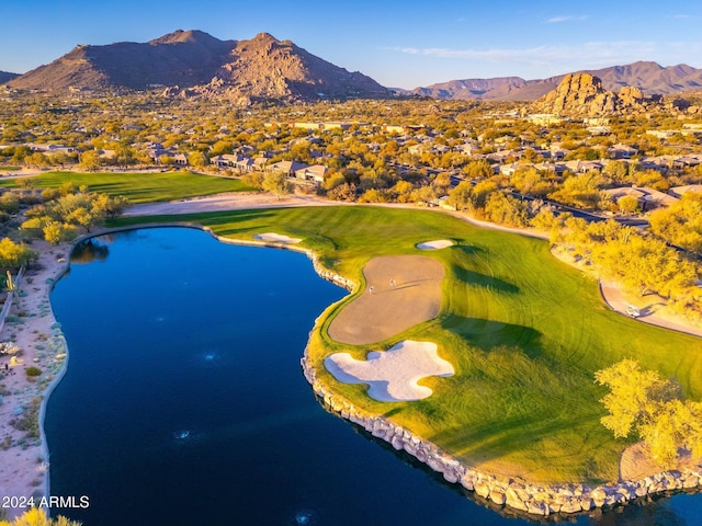 bird's eye view with a water and mountain view