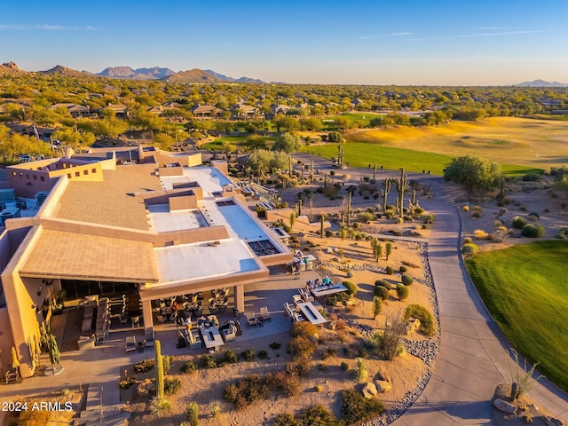 birds eye view of property featuring a mountain view