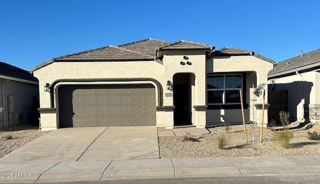 view of front of home with a garage