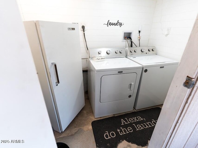 1705 S Cedar Dr, Apache Junction, AZ 85120 - laundry area featuring washer and clothes dryer and stone finish flooring