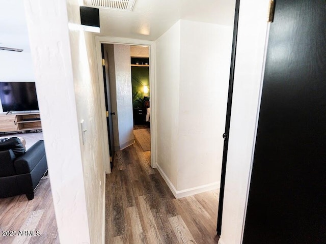 1705 S Cedar Dr, Apache Junction, AZ 85120 - hallway with wood finished floors