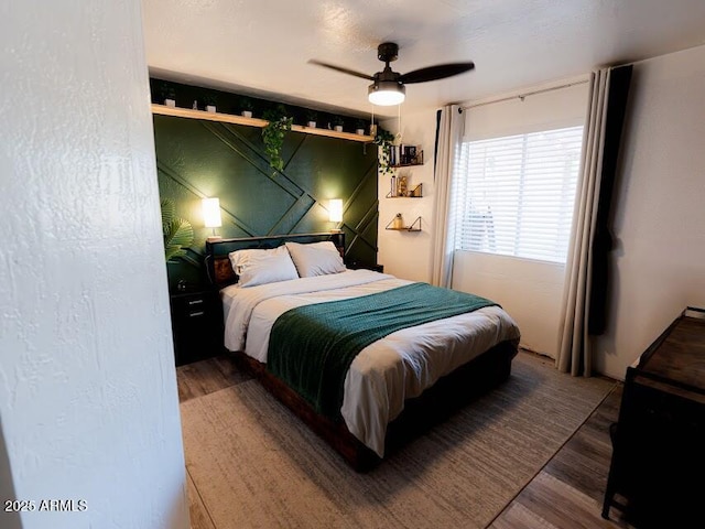 1705 S Cedar Dr, Apache Junction, AZ 85120 - bedroom featuring wood finished floors and ceiling fan