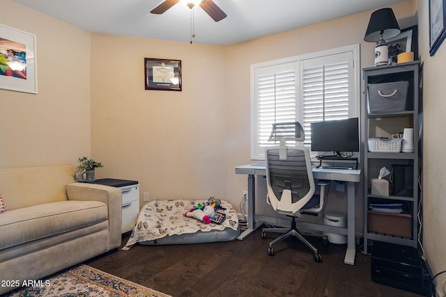 office area featuring dark wood-type flooring and ceiling fan