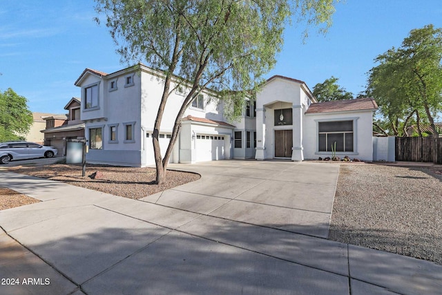 view of front of property featuring a garage