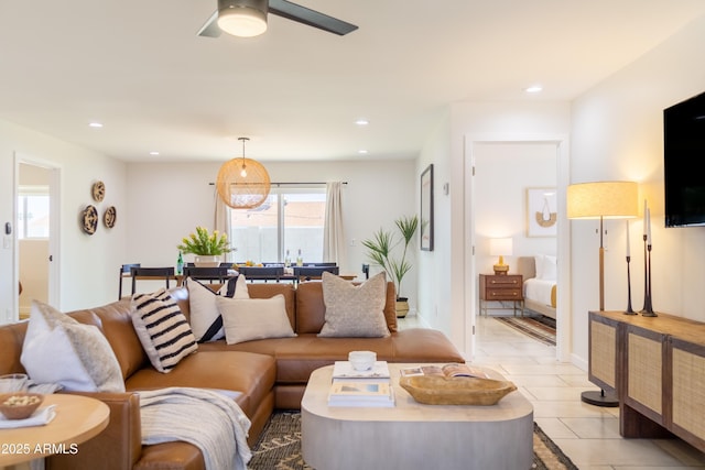 6907 E Palm Ln, Scottsdale, AZ 85257 - living room with light tile patterned flooring, a ceiling fan, and recessed lighting