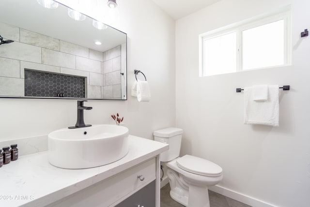6907 E Palm Ln, Scottsdale, AZ 85257 - bathroom with vanity and toilet