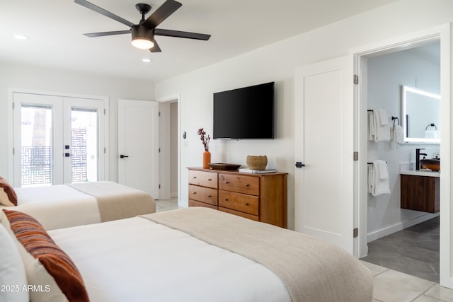 6907 E Palm Ln, Scottsdale, AZ 85257 - bedroom featuring access to outside, french doors, ensuite bathroom, light tile patterned floors, and recessed lighting
