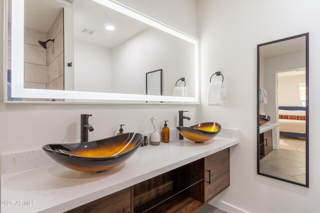 6907 E Palm Ln, Scottsdale, AZ 85257 - ensuite bathroom featuring double vanity