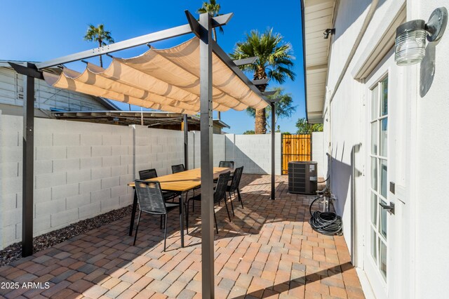 6907 E Palm Ln, Scottsdale, AZ 85257 - fenced backyard featuring a pergola, a patio, and outdoor dining area