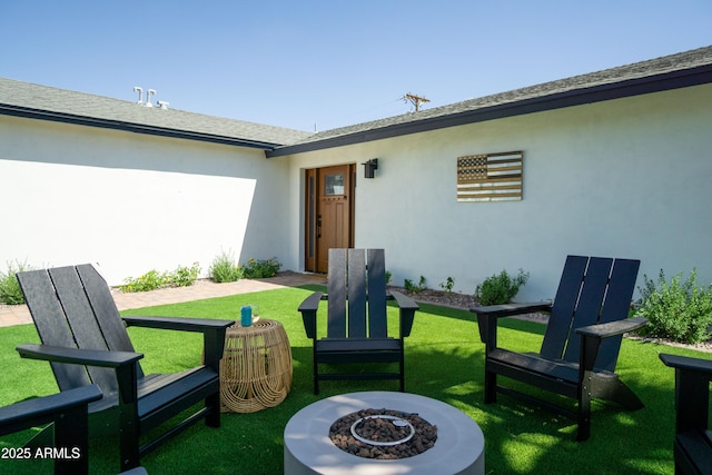 6907 E Palm Ln, Scottsdale, AZ 85257 - view of green lawn featuring a fire pit