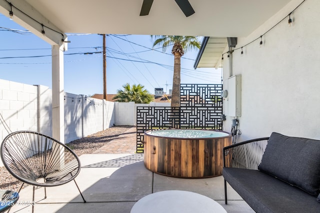 6907 E Palm Ln, Scottsdale, AZ 85257 - fenced backyard with a ceiling fan and a patio