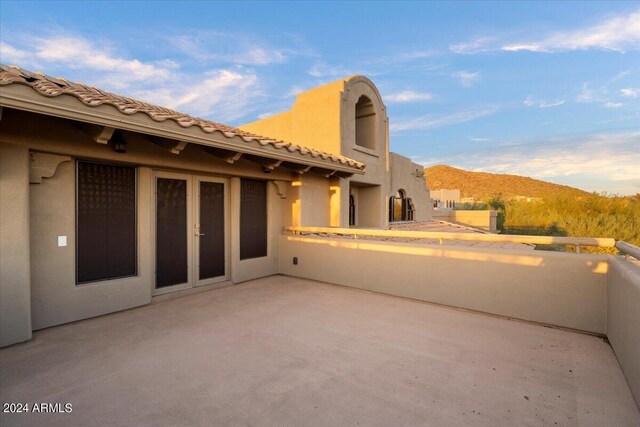 view of patio / terrace with a mountain view