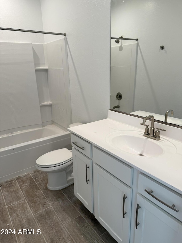 full bathroom with shower / bathing tub combination, vanity, and toilet