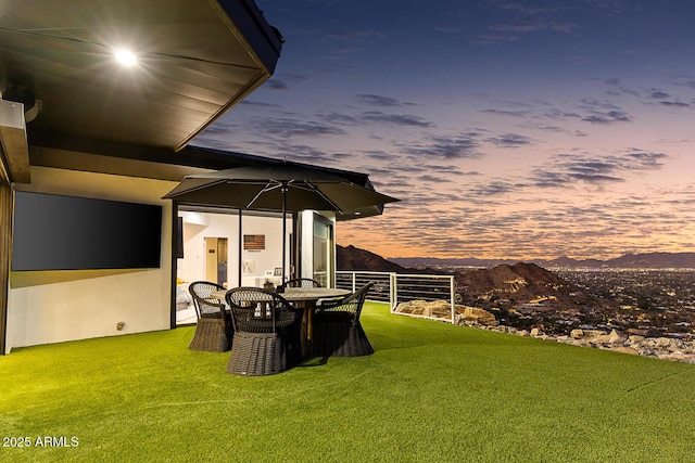 yard at dusk with a mountain view