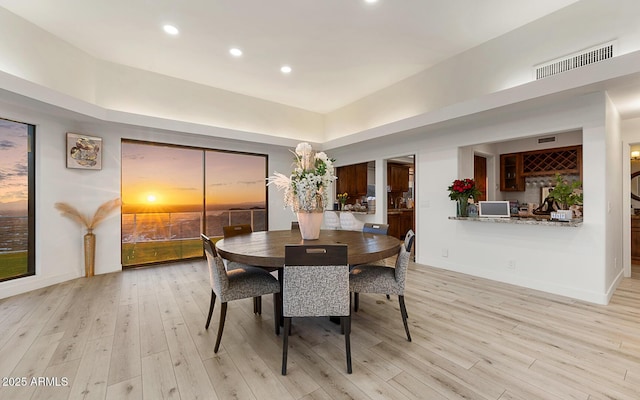 dining room featuring light wood-type flooring