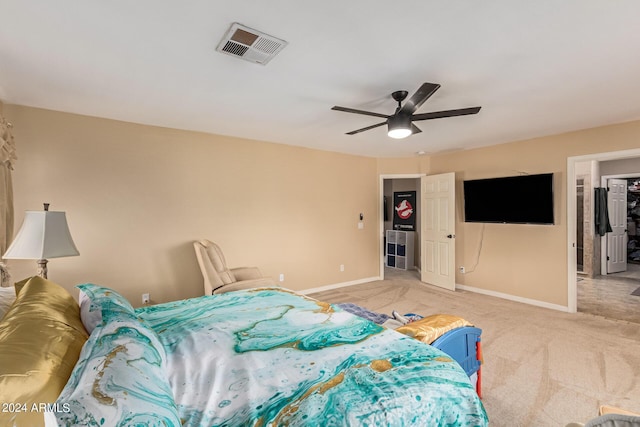 bedroom with carpet, baseboards, visible vents, and a ceiling fan