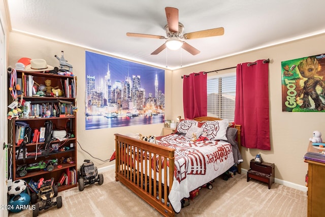 bedroom featuring carpet flooring, ceiling fan, and baseboards