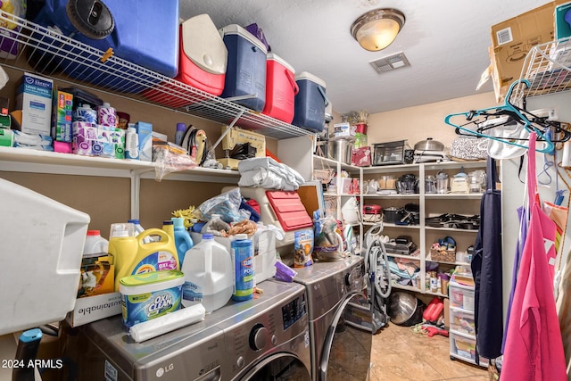 interior space with visible vents and washer and dryer