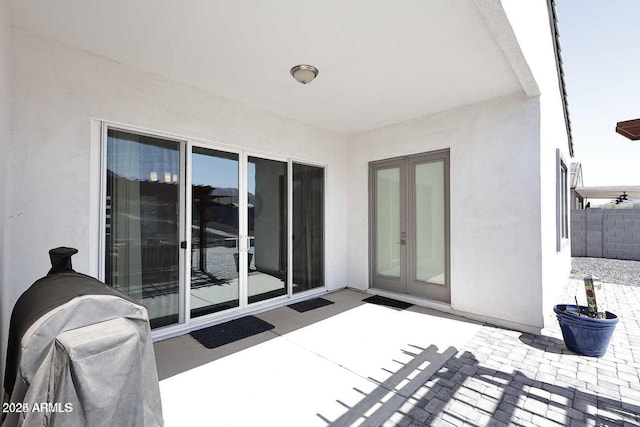 view of patio featuring french doors