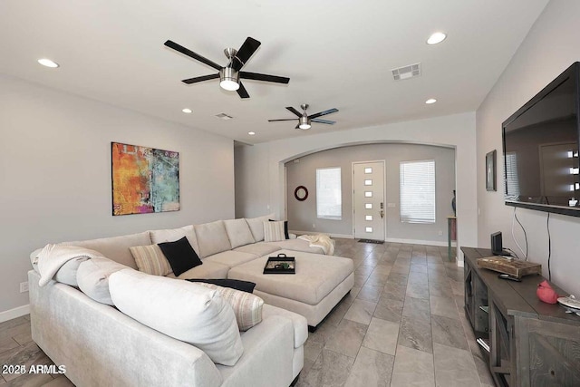 living room with ceiling fan