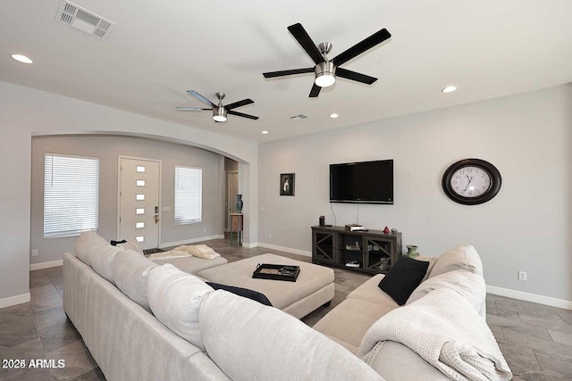 living room with ceiling fan