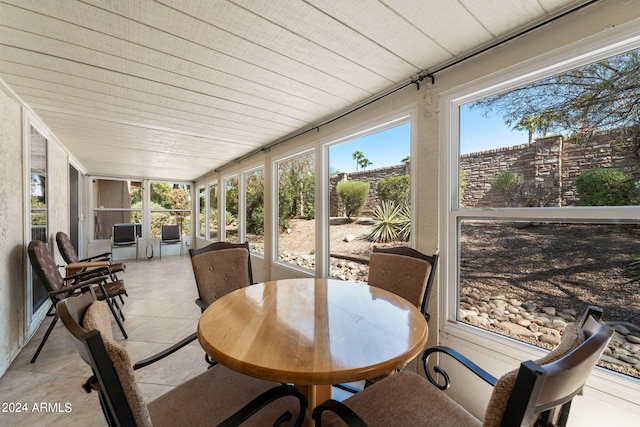 sunroom with wood ceiling