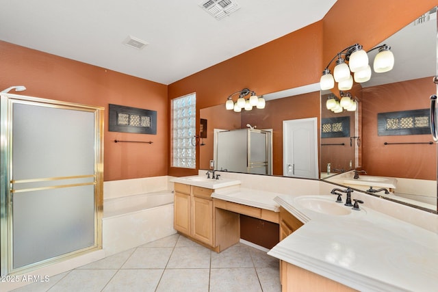 full bathroom featuring a sink, visible vents, a shower stall, a bath, and tile patterned floors