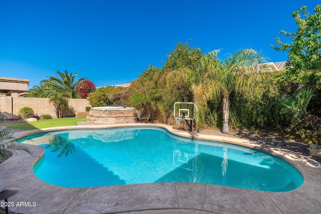 view of pool with a fenced backyard and a fenced in pool