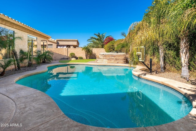 view of pool featuring a fenced backyard and a fenced in pool