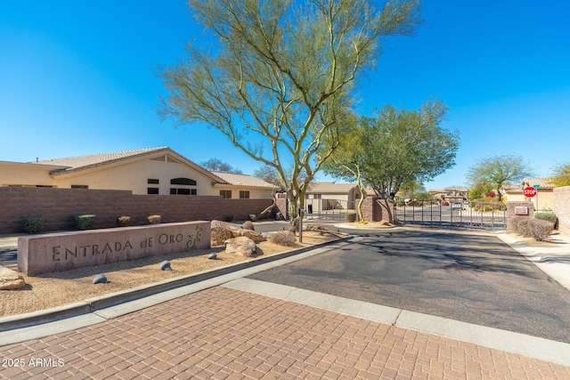 exterior space featuring a gate and fence