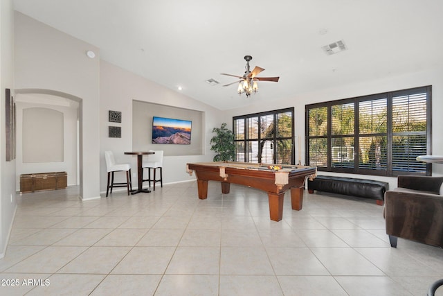 rec room with light tile patterned floors, arched walkways, and visible vents