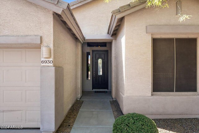 entrance to property with a garage