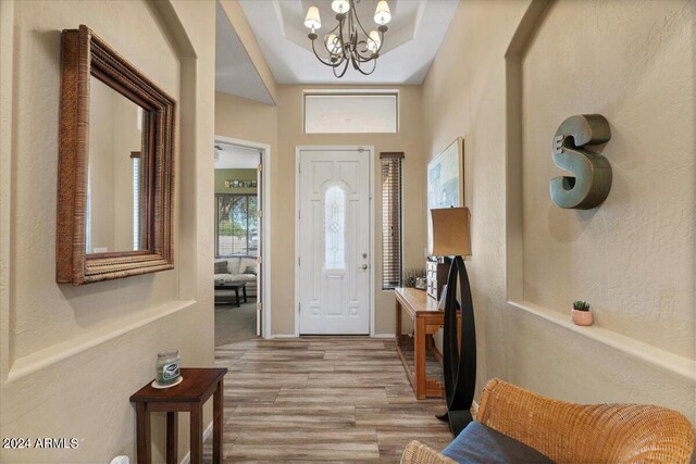 hallway with hardwood / wood-style floors