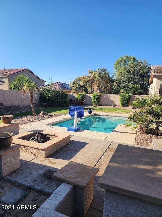 view of pool featuring a patio area