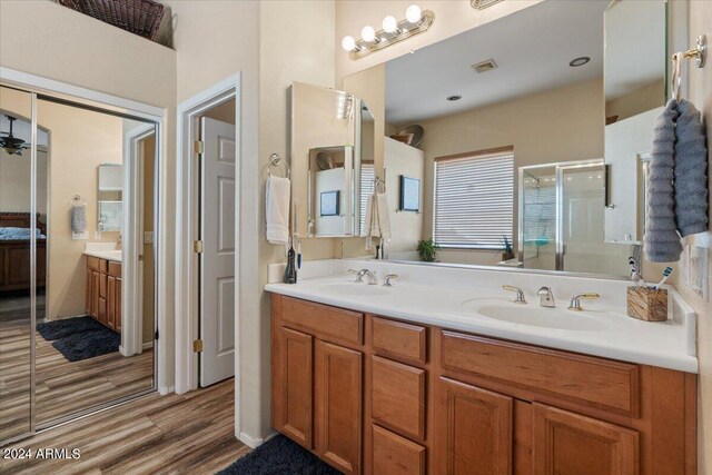 playroom with an inviting chandelier and hardwood / wood-style floors