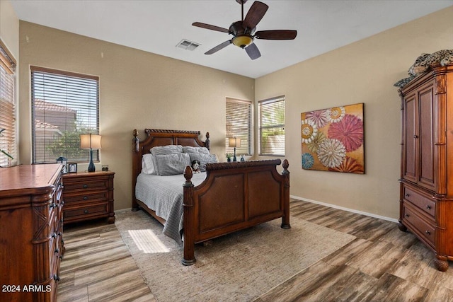 bedroom featuring ceiling fan and hardwood / wood-style flooring