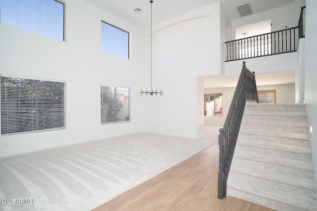 6014 W Oberlin Way, Phoenix, AZ 85083 - stairs with a towering ceiling and wood finished floors