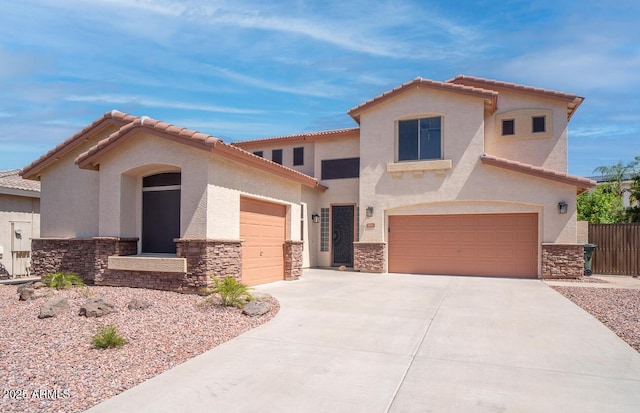 6014 W Oberlin Way, Phoenix, AZ 85083 - mediterranean / spanish-style house with stone siding, stucco siding, concrete driveway, and a tiled roof