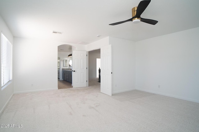 6014 W Oberlin Way, Phoenix, AZ 85083 - spare room with ceiling fan, light carpet, healthy amount of natural light, and arched walkways