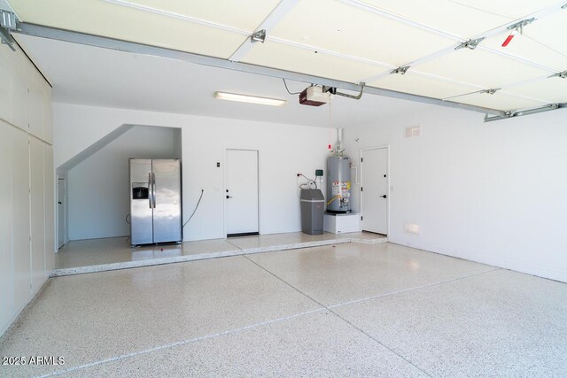 6014 W Oberlin Way, Phoenix, AZ 85083 - garage with stainless steel refrigerator with ice dispenser, gas water heater, and a garage door opener