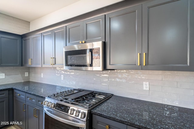 6014 W Oberlin Way, Phoenix, AZ 85083 - kitchen with appliances with stainless steel finishes, tasteful backsplash, and dark stone countertops